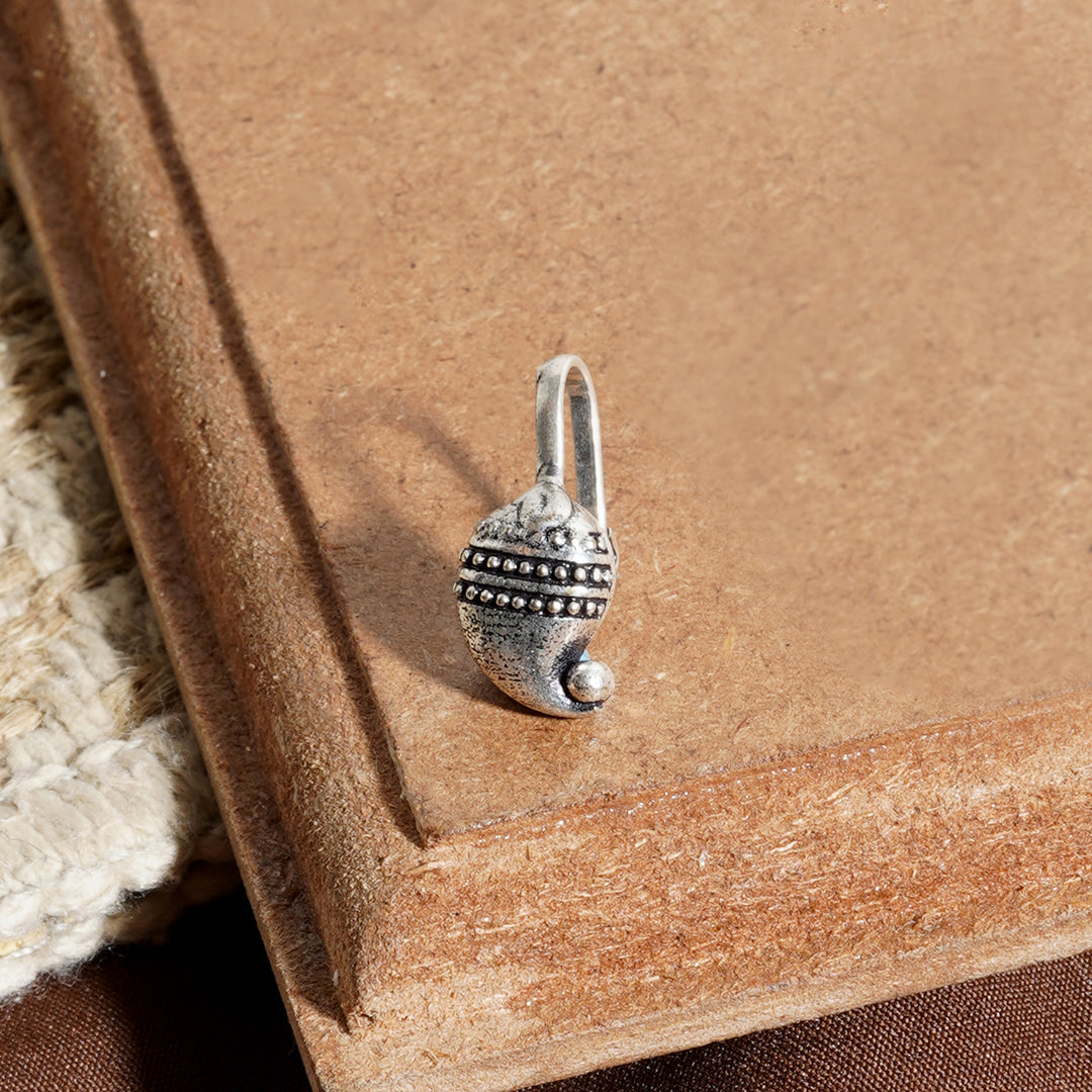 Ambi Silver Oxidised Nose Pin