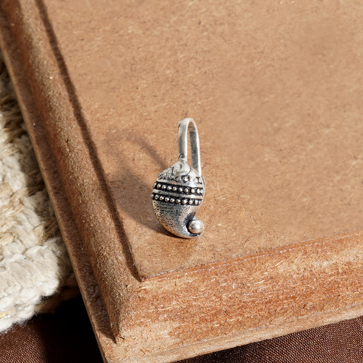 Ambi Silver Oxidised Nose Pin