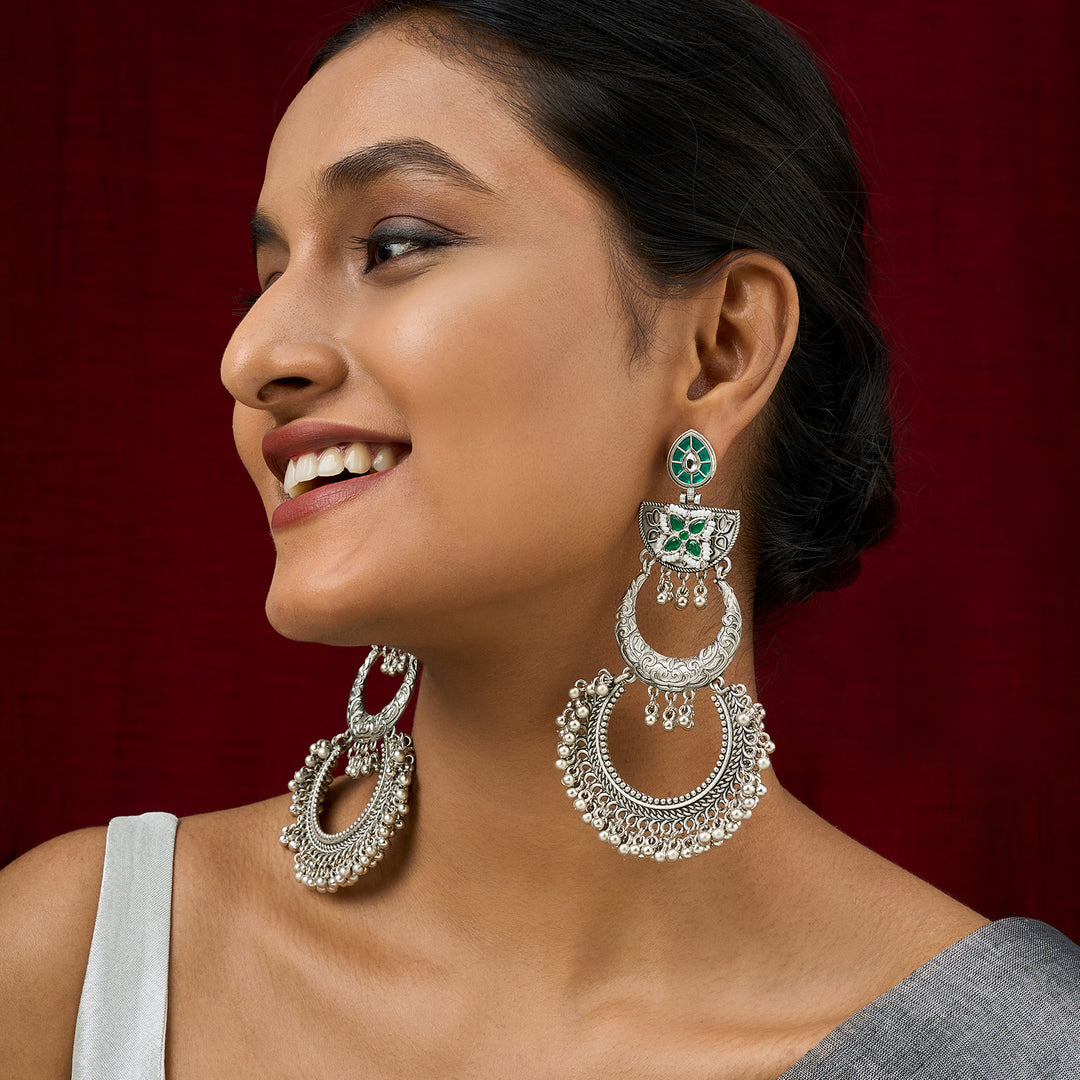 Teejh Aarzaa Silver Ghungroo Green Stone Chandbali