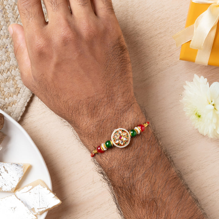 Teejh Kiran Floral Red and Green Kundan Thread Rakhi