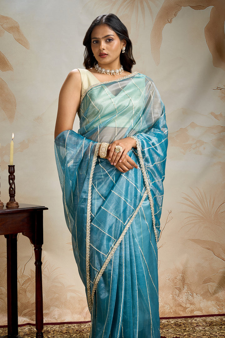 Teejh Ziaya Teal Blue Net Gota Saree