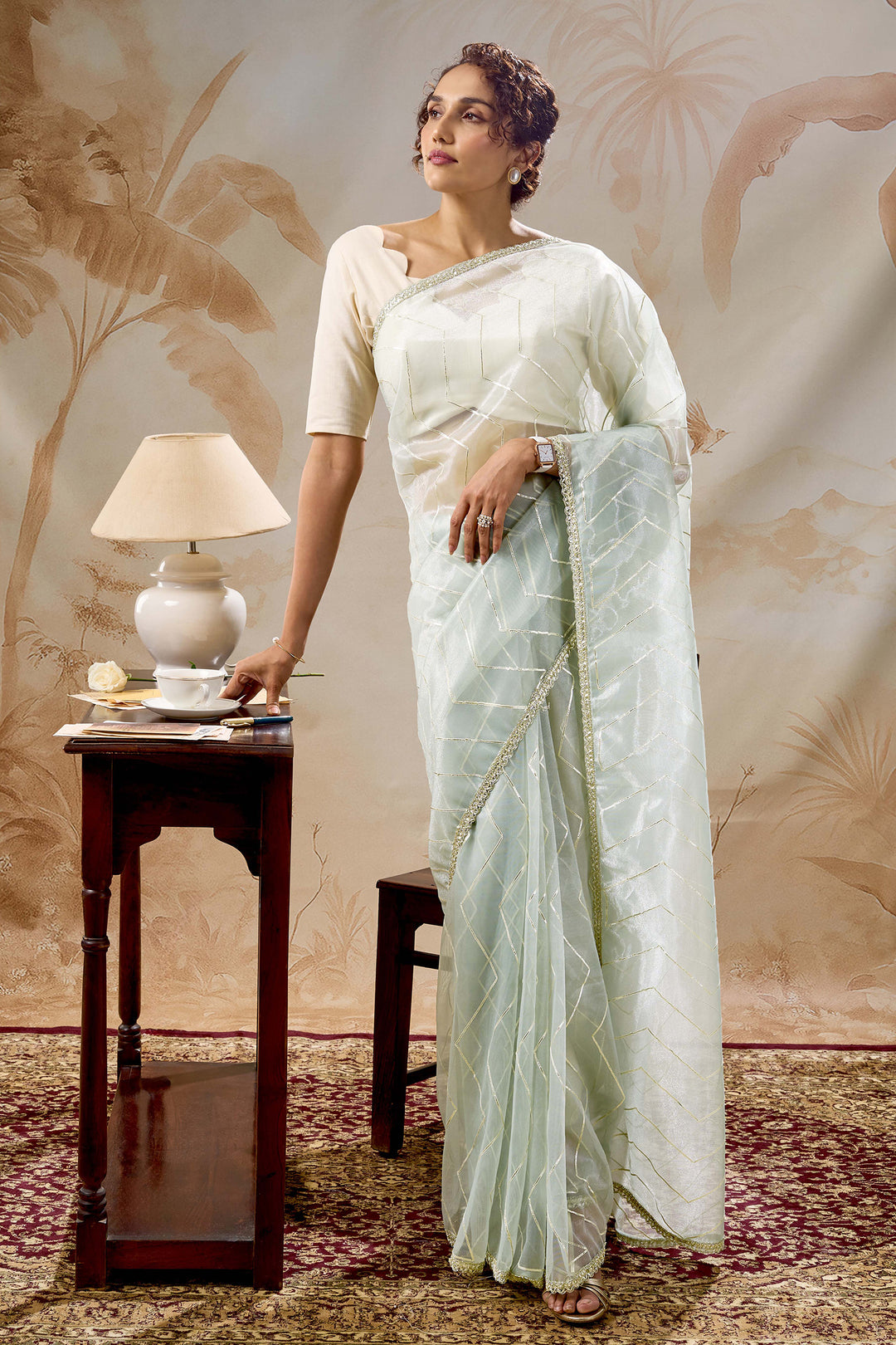 Teejh Rabina sage Green Net Gota Saree