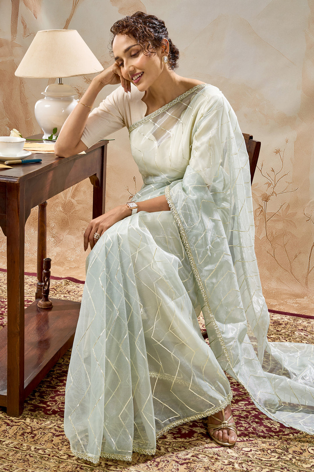 Teejh Rabina sage Green Net Gota Saree