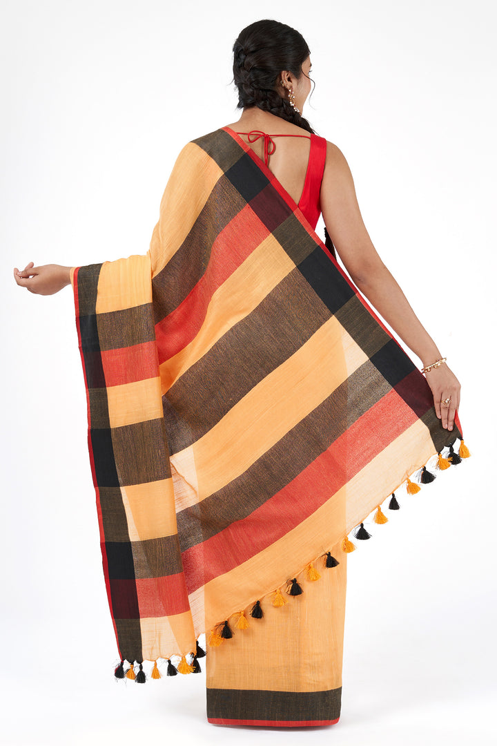 Teejh Soothing Peach, red and black Color Block Saree
