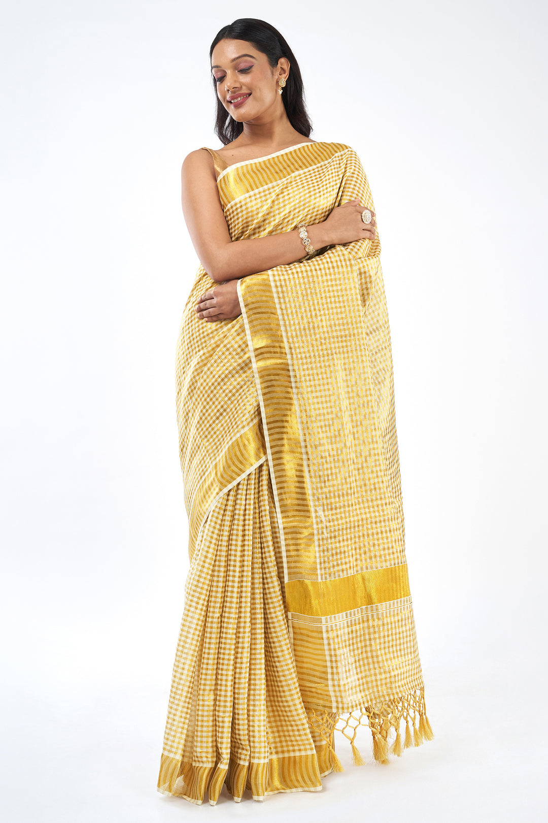 Teejh Kairali Zari Checkered Kasavu Saree