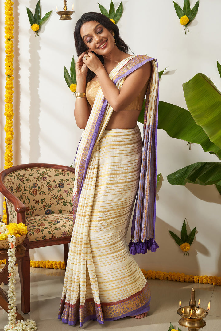 Teejh Malya Off white and Purple Zari Stripes Mul Cotton Saree