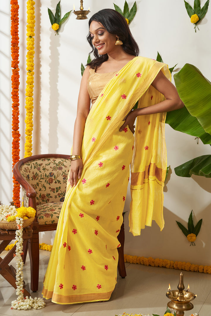 Teejh Pookal Off white and Yellow Floral Tassel Saree