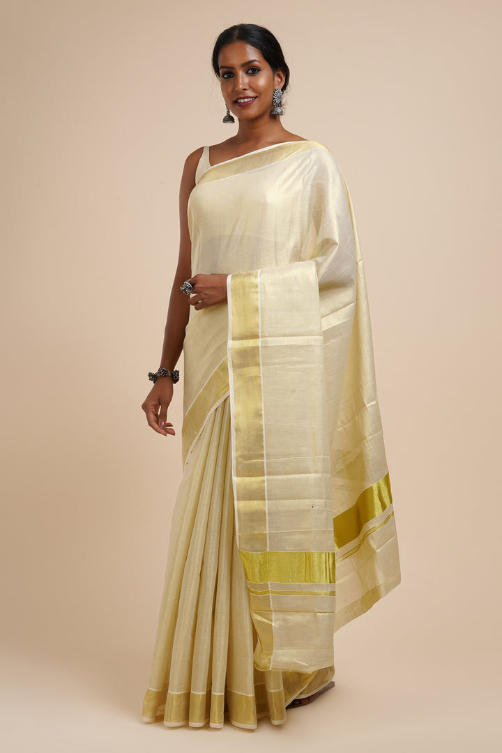 Teejh Ariata Golden Kerala Tissue Kasavu saree