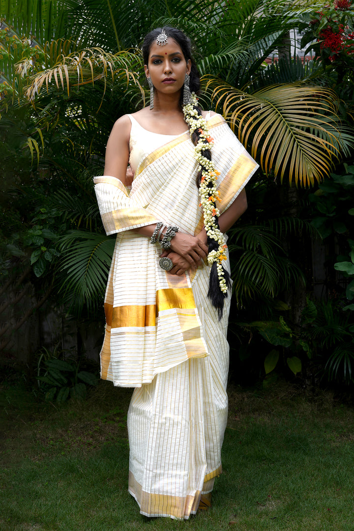 Teejh Madhavi White and Gold Kerala Cotton Kasavu Saree