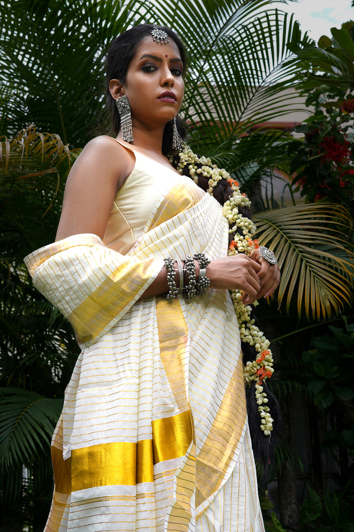 Teejh Madhavi White and Gold Kerala Cotton Kasavu Saree