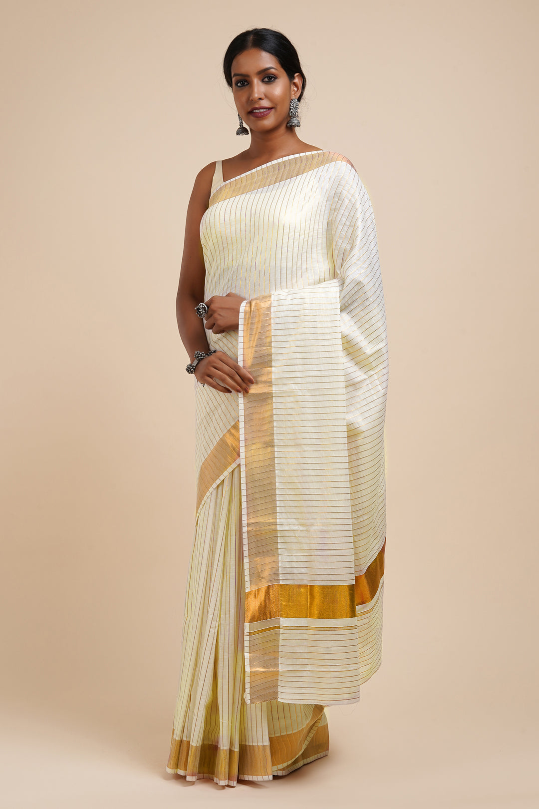 Teejh Madhavi White and Gold Kerala Cotton Kasavu Saree