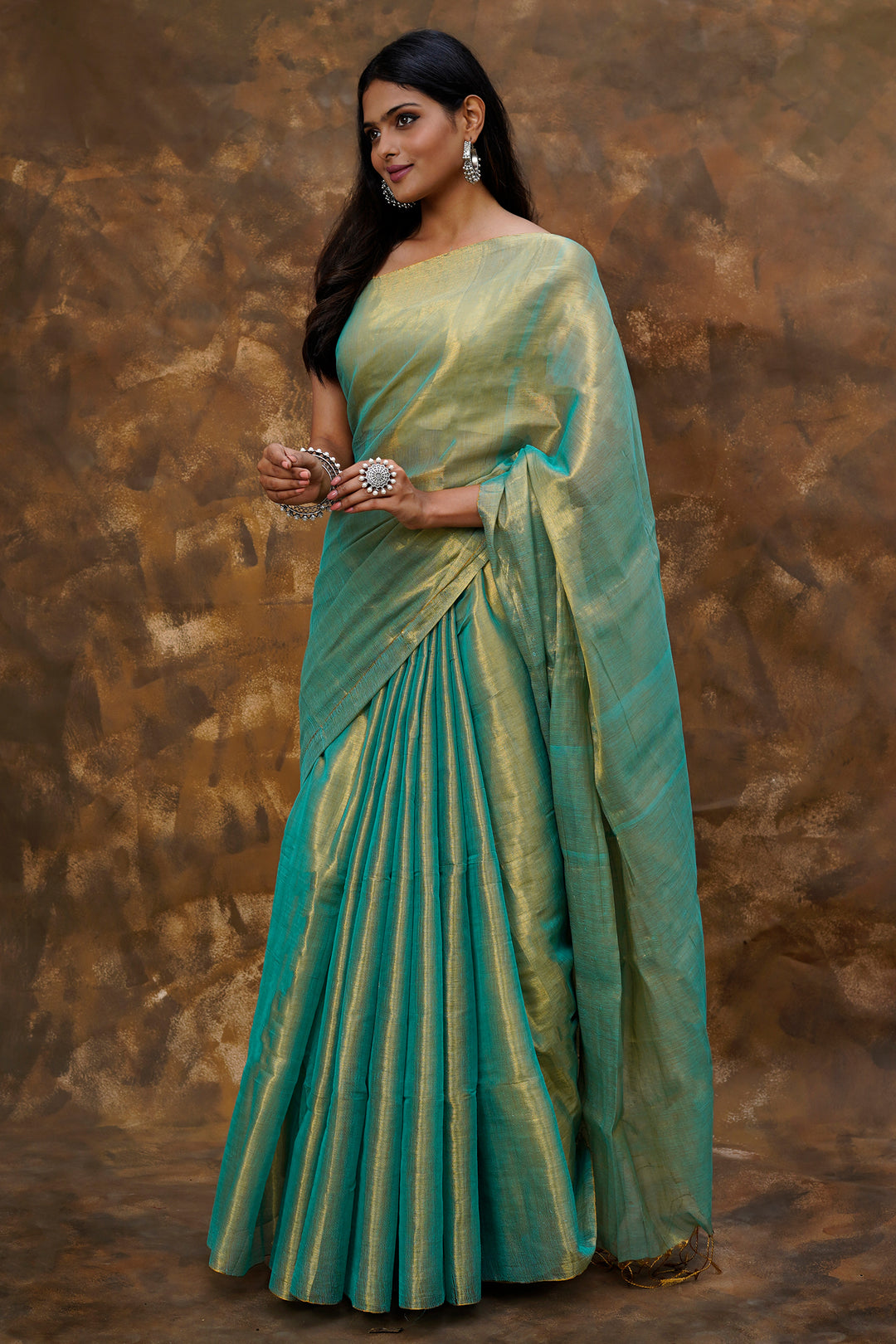 Teejh Trishika Peacock Green Tissue Saree