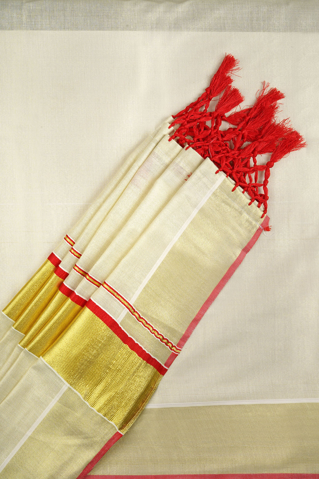 Teejh Kabani Kerala Tissue Red Saree