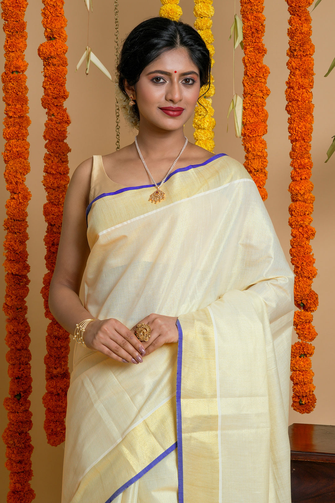 Teejh Manimala Kerala Tissue Royal blue Saree