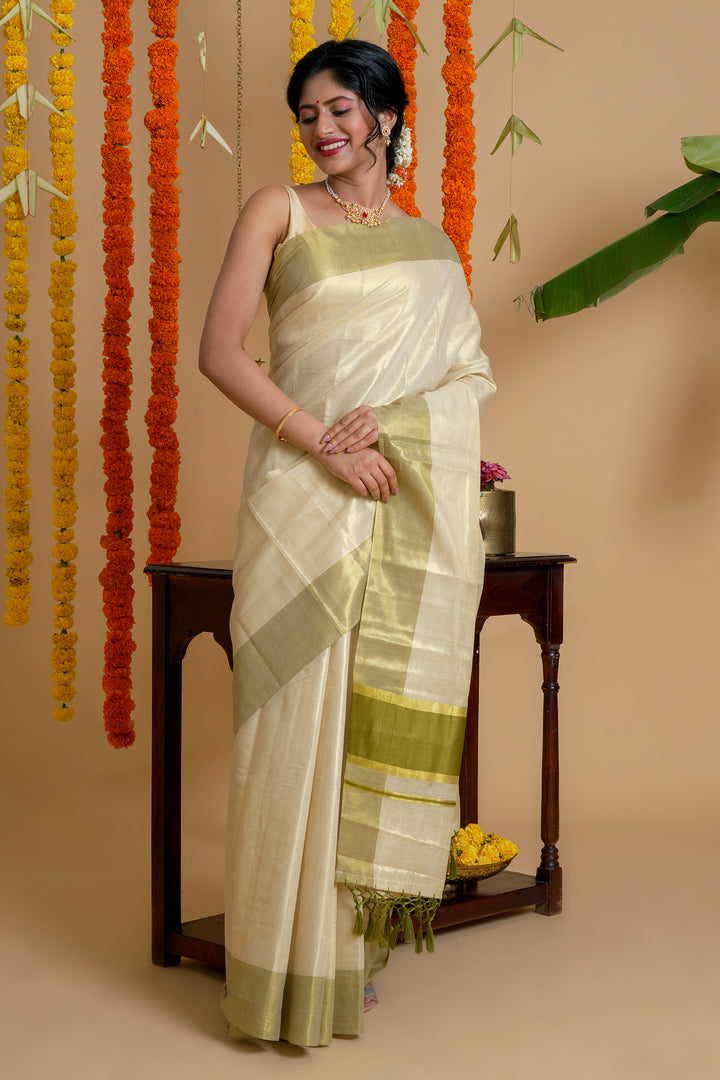 Teejh Valapatnam Kerala Tissue Light green Saree