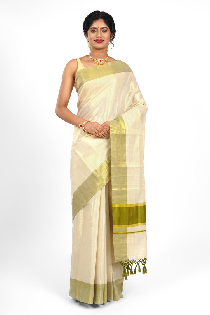 Teejh Valapatnam Kerala Tissue Light green Saree