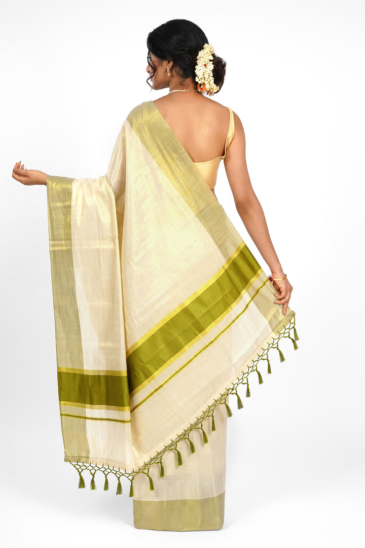 Teejh Valapatnam Kerala Tissue Light green Saree