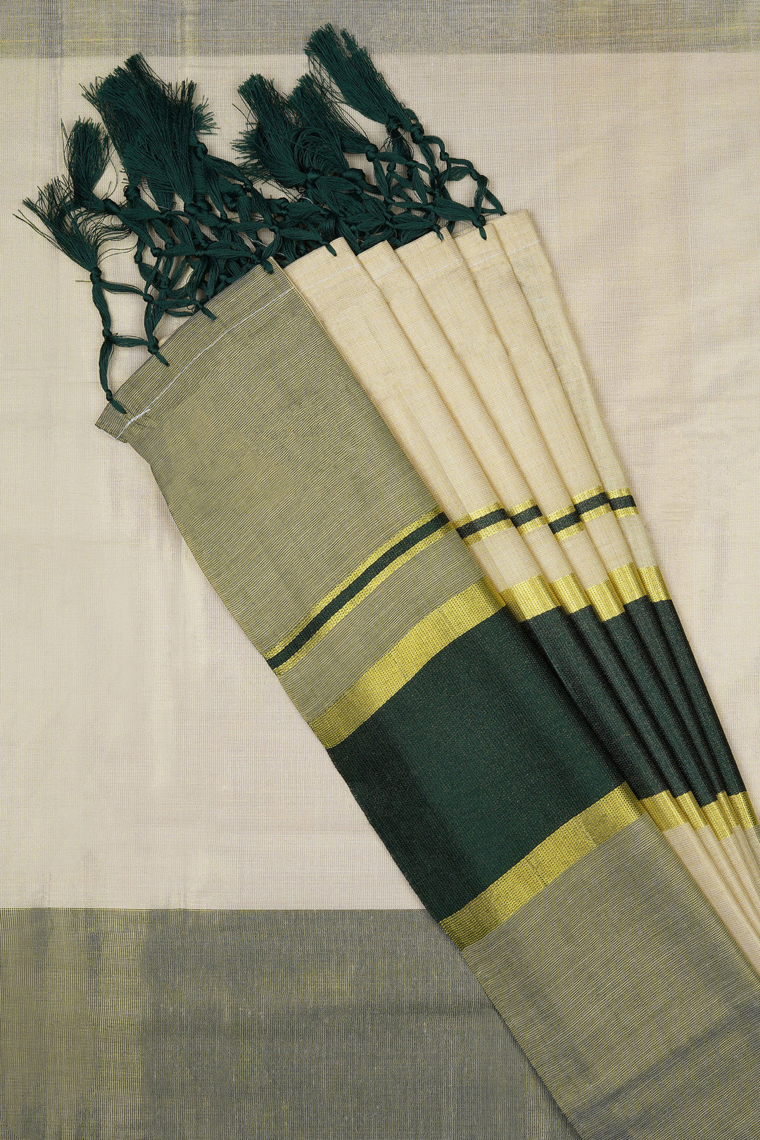 Teejh Pookode Kerala Tissue Dark green Saree