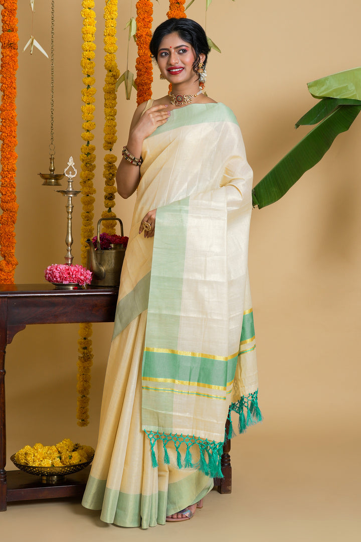 Teejh Muvatupuzha Kerala Tissue Turquoise Saree