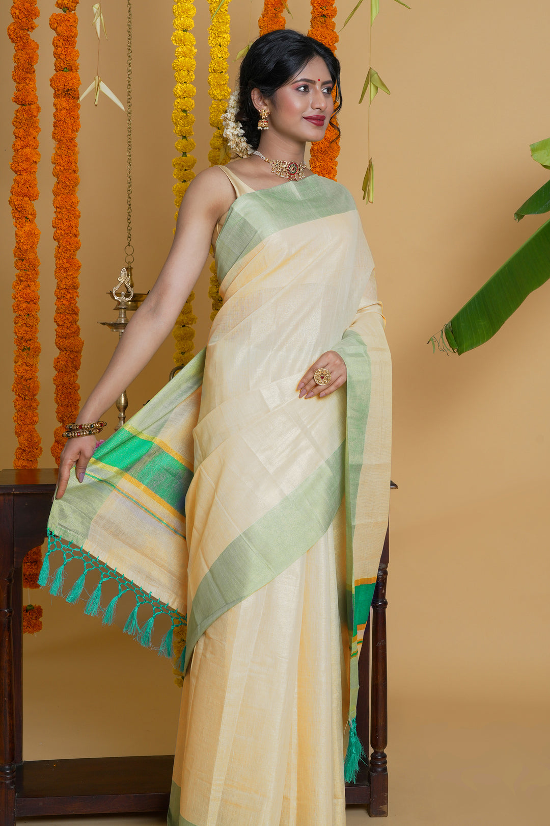 Teejh Muvatupuzha Kerala Tissue Turquoise Saree
