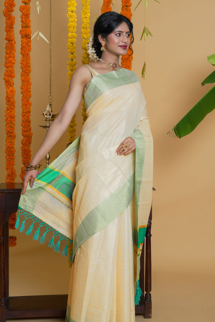 Teejh Muvatupuzha Kerala Tissue Turquoise Saree