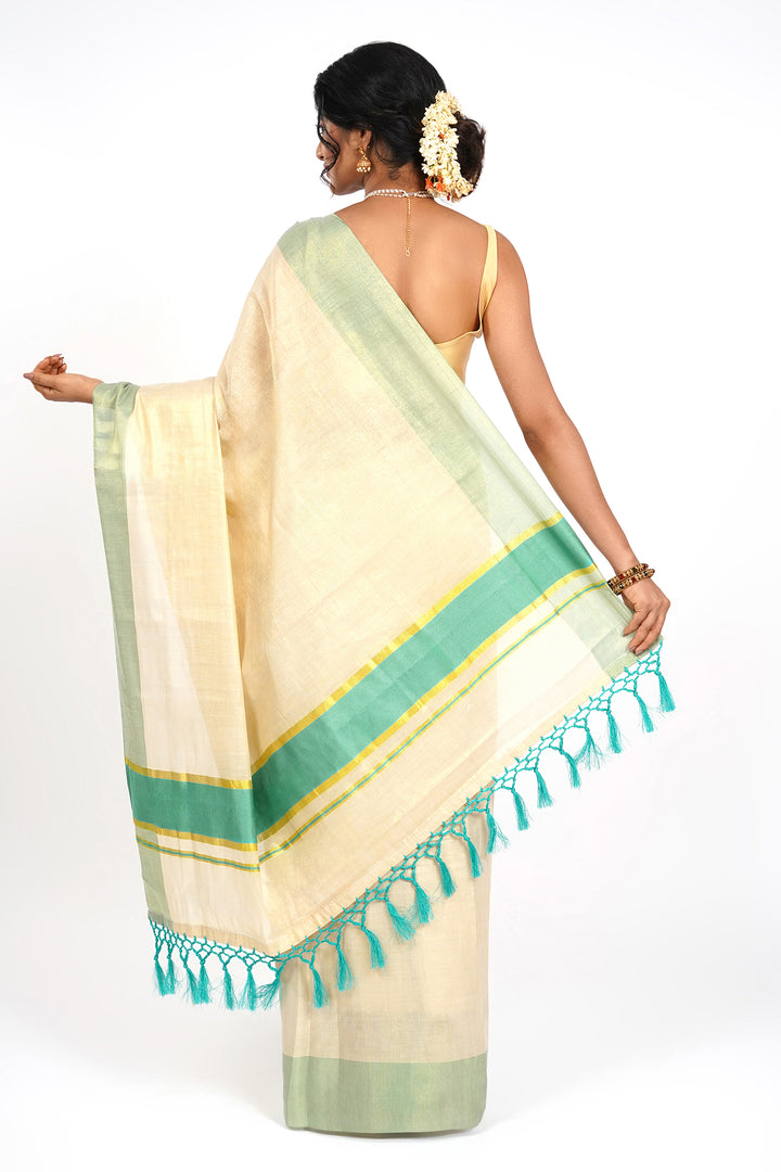Teejh Muvatupuzha Kerala Tissue Turquoise Saree