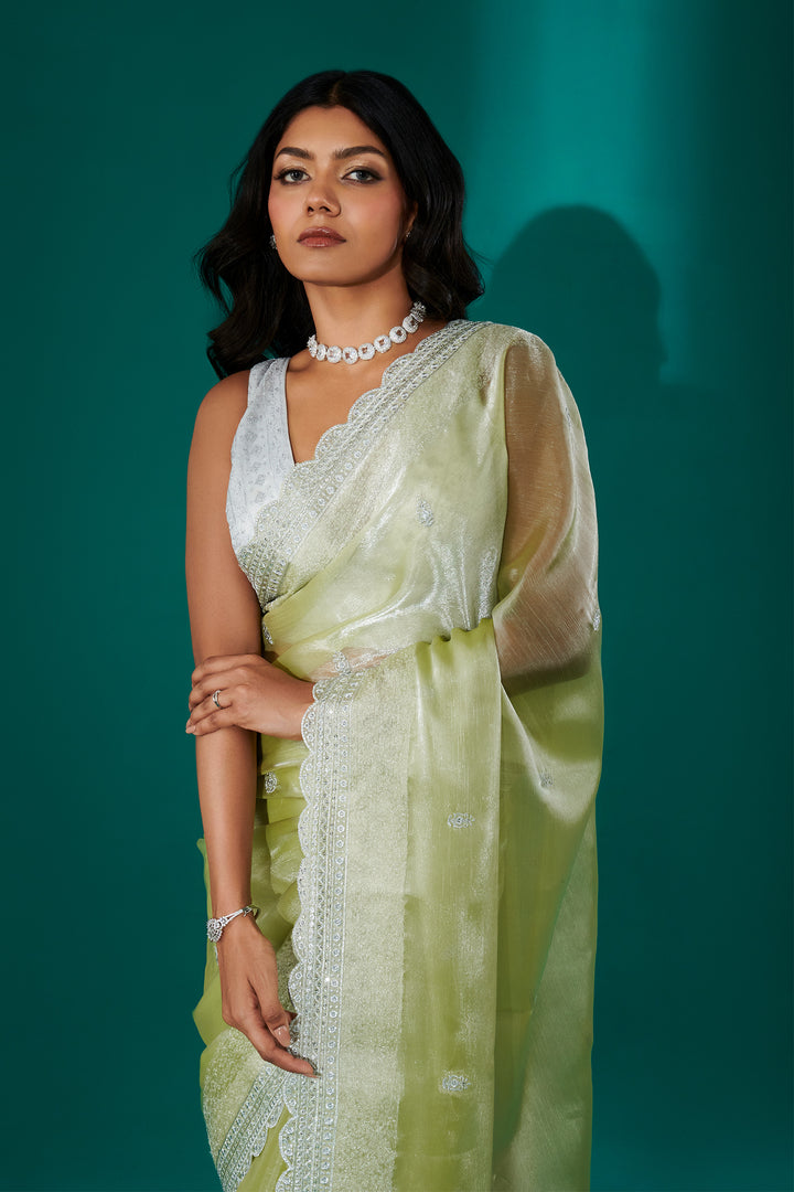 Teejh Geetanjali Green Shimmer Tissue Saree