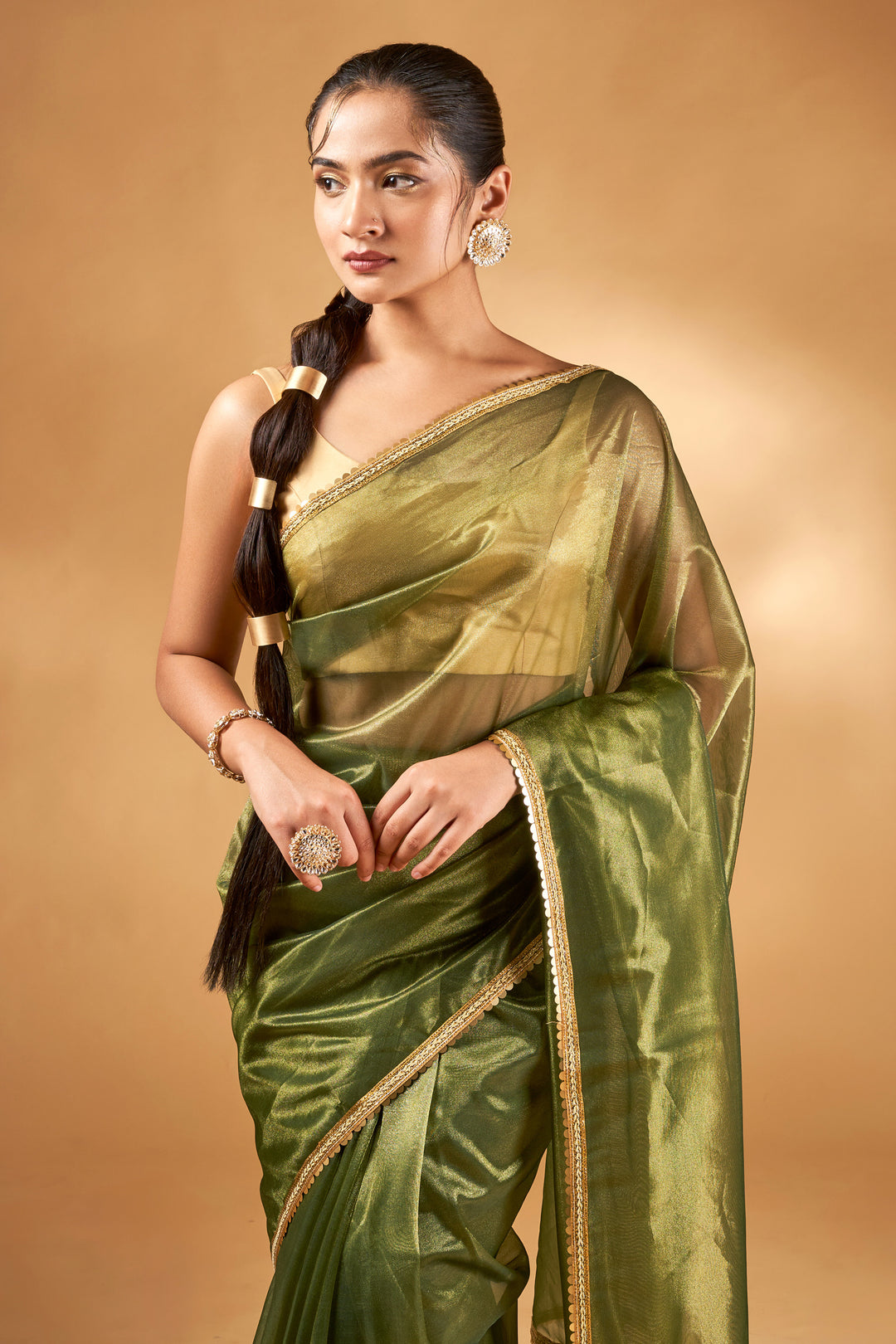 Teejh Iraja Olive Green Net Saree
