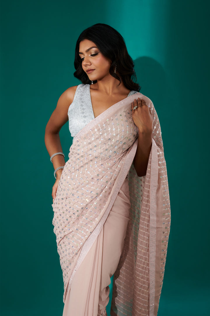 Teejh Ujwal Peach Georgette Saree
