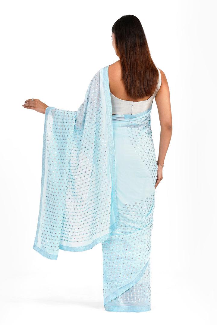 Teejh Ujwal Sky Blue Georgette Saree