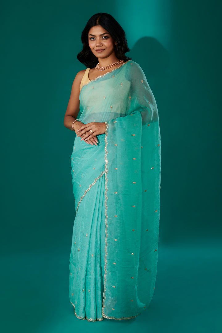 Teejh Dilbar Turquoise Georgette Saree