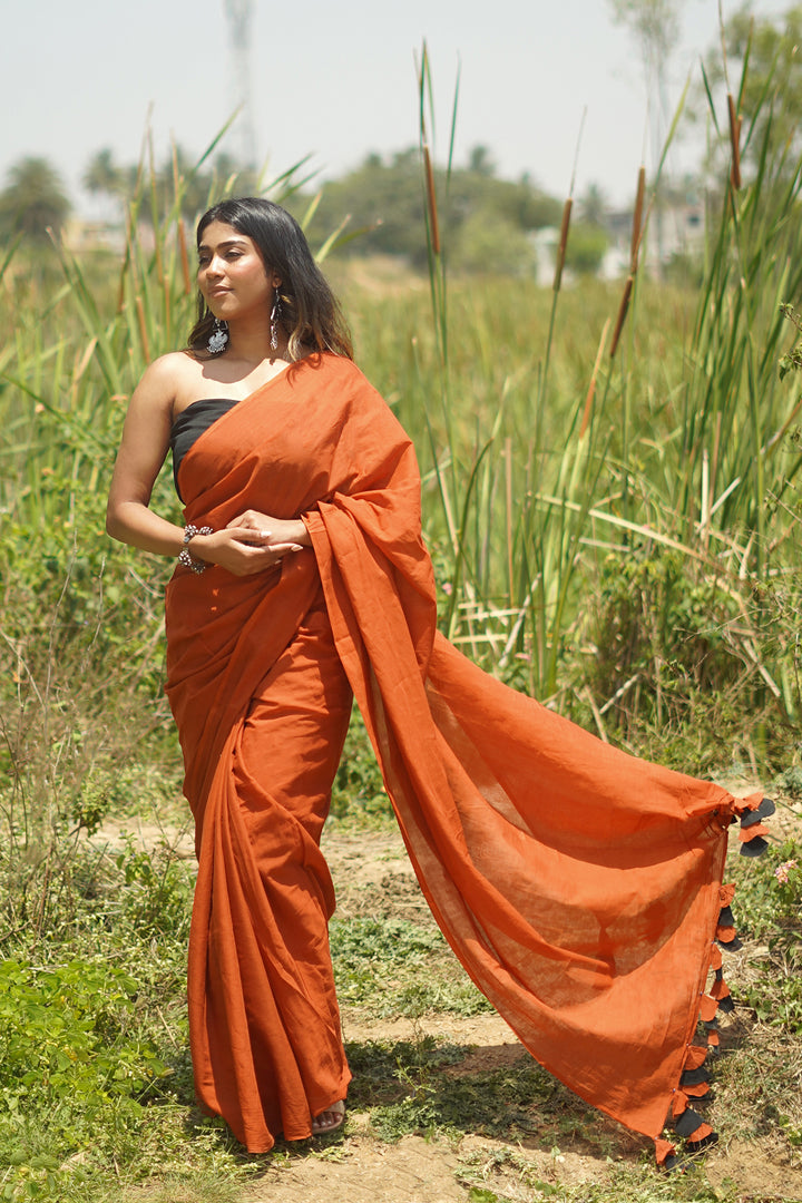 Teejh Dusk and Dawn Rust Orange  and Black Mulmul Saree