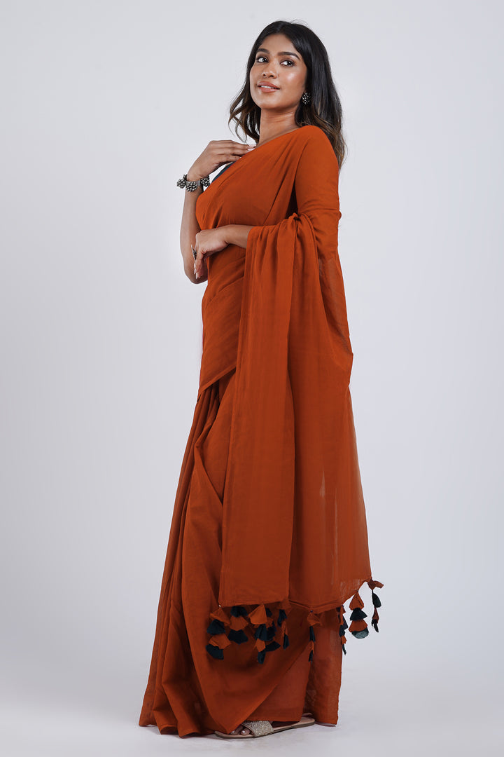 Teejh Dusk and Dawn Rust Orange  and Black Mulmul Saree