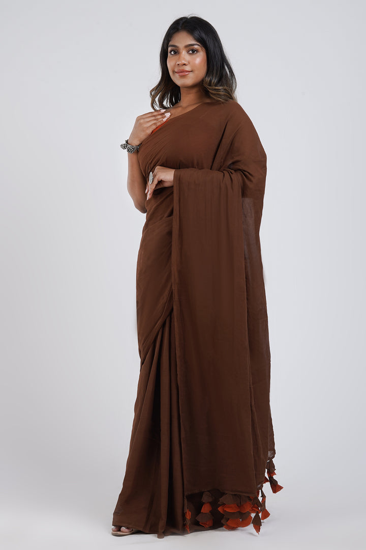Teejh Sun and Saturn Brown and Rust Orange Mulmul Saree