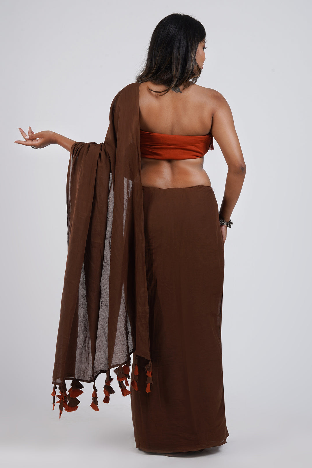 Teejh Sun and Saturn Brown and Rust Orange Mulmul Saree