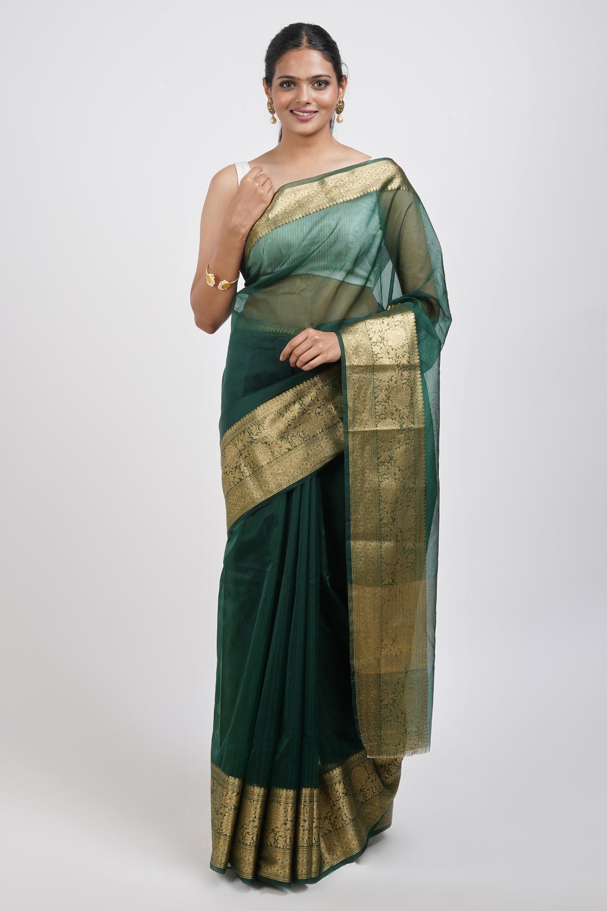 𝗕𝗮𝗵𝗮𝗮𝗿 Featuring our bottle green organza saree paired with a  chanderi base blouse with gold dori and aari embroidery on it. Styling &… |  Instagram